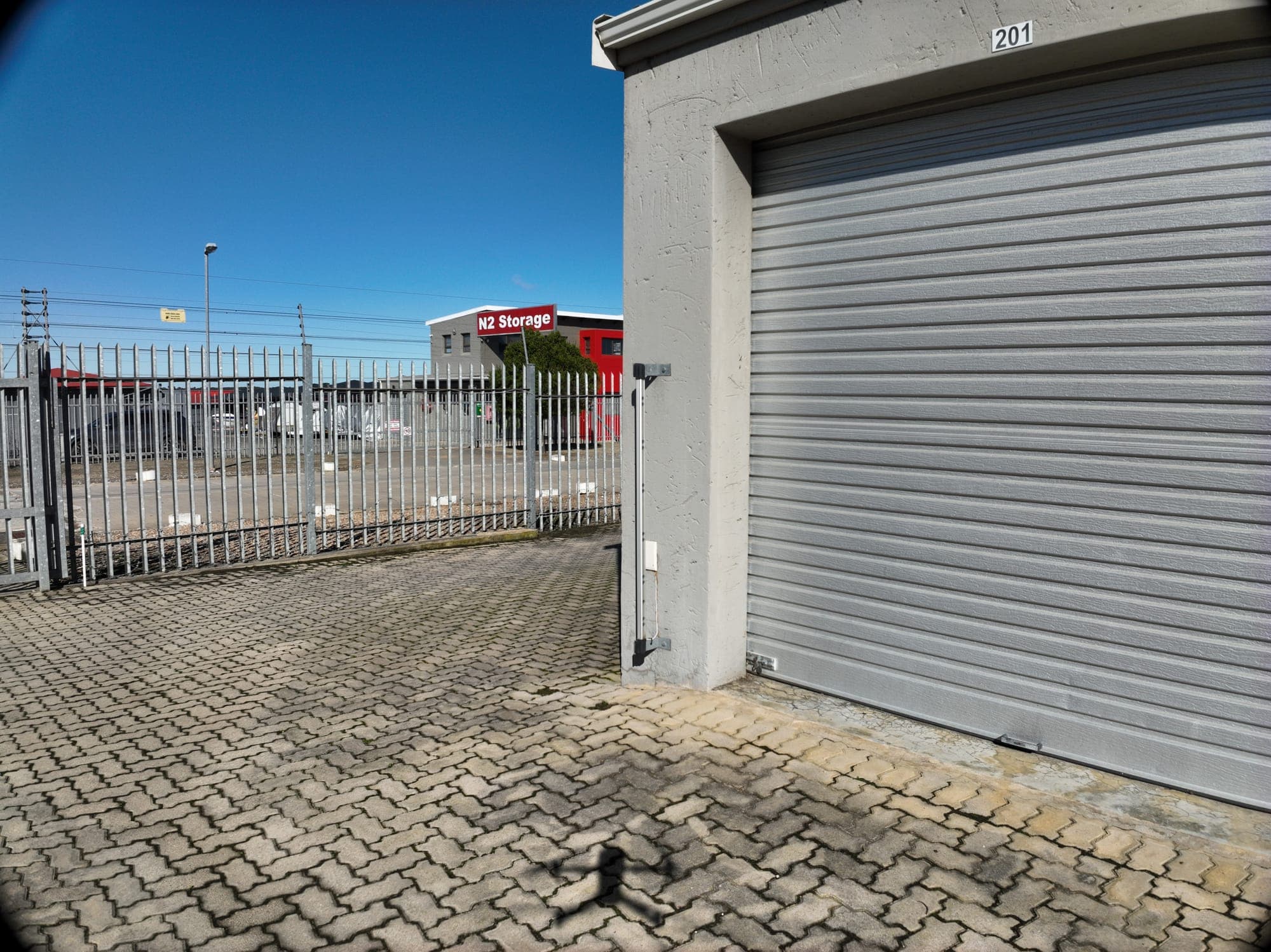 Motorised security gate at the entrance